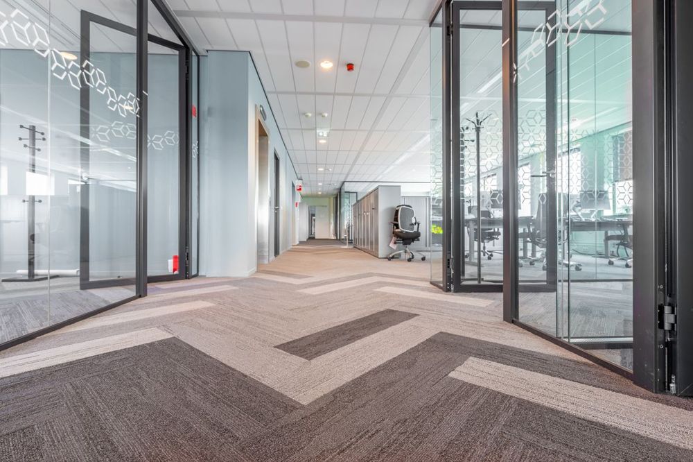 Modern office hallway with carpet cleaned for a Redding, CT business