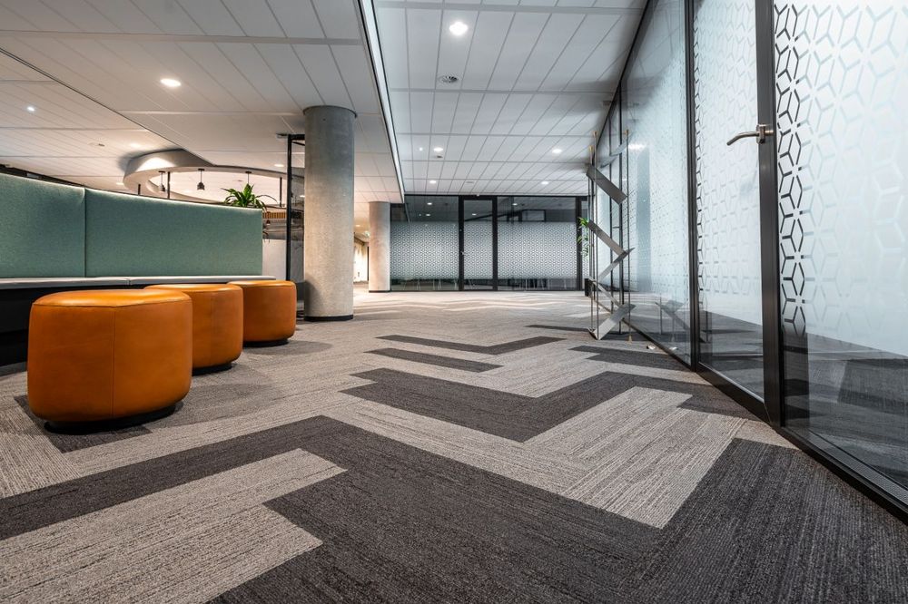 Modern office hallway with carpet cleaned for a Monroe, CT business